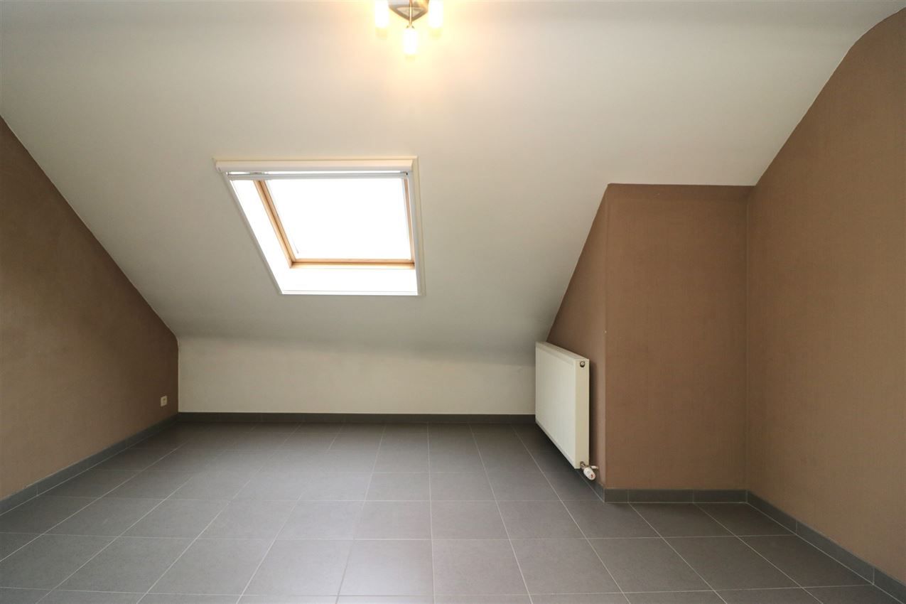 Duplex-appartement met 2 slpk., terras, autostaanplaats in centrum foto 15