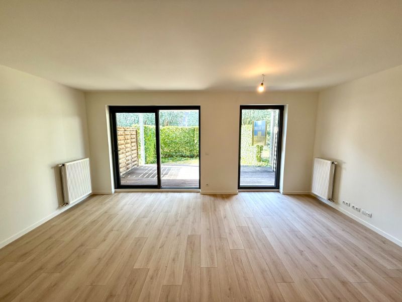 Centraal gelegen, gelijkvloers appartement met 2 slaapkamers en ruim terras met zicht op de Leie foto 4
