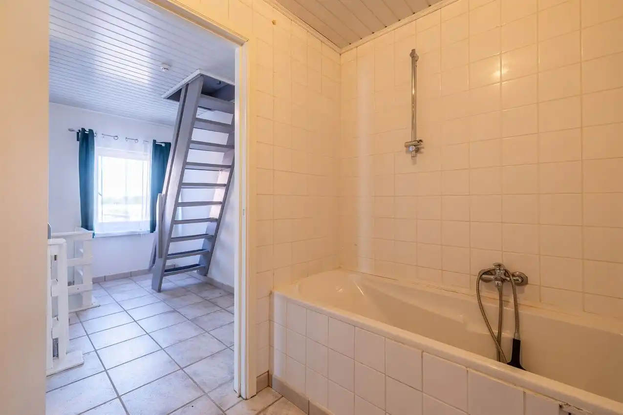 Verzorgde woning met 2 slpk., tuin en garage foto 23