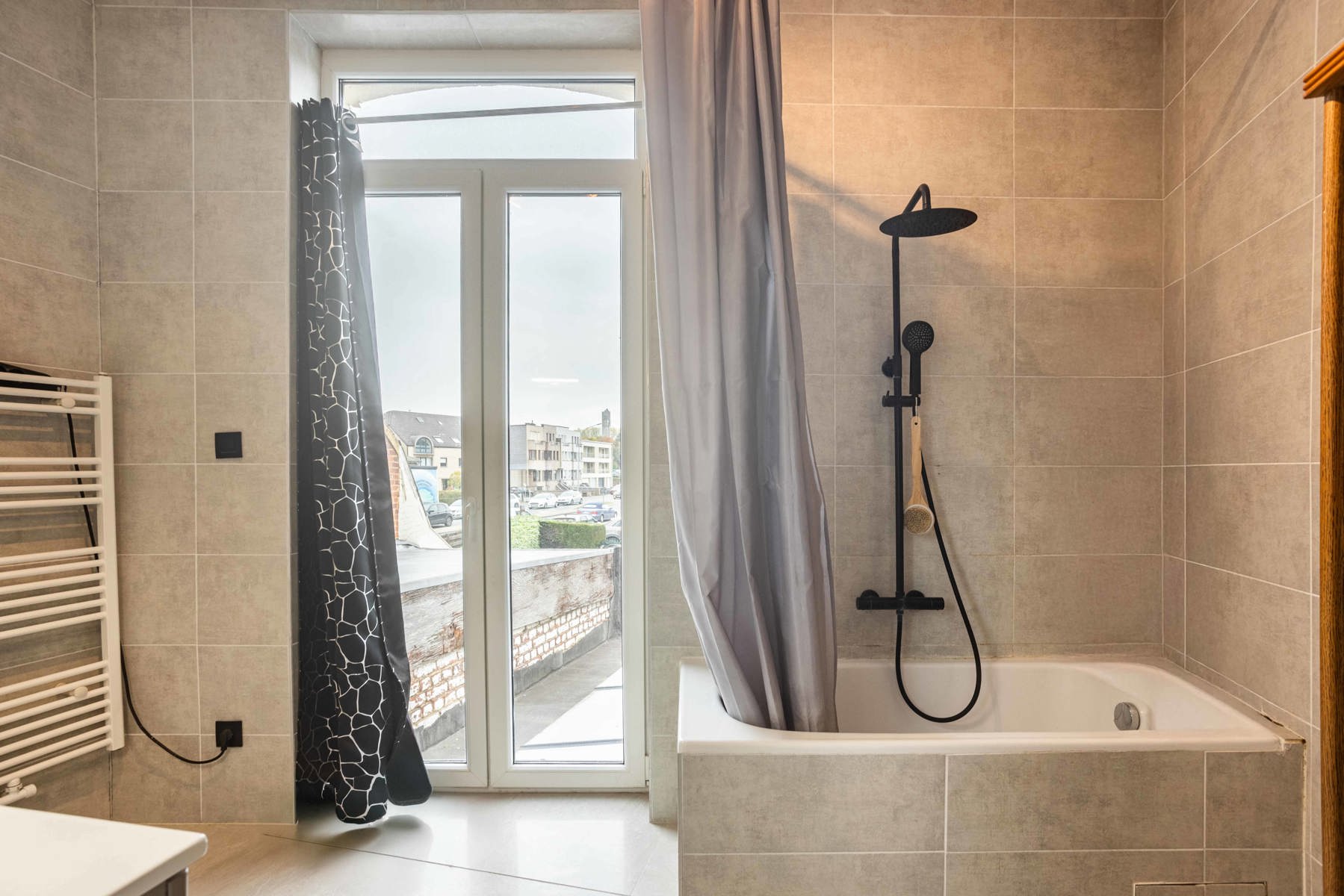 Gerenoveerde stadswoning met tuin en 3 SLP foto 17