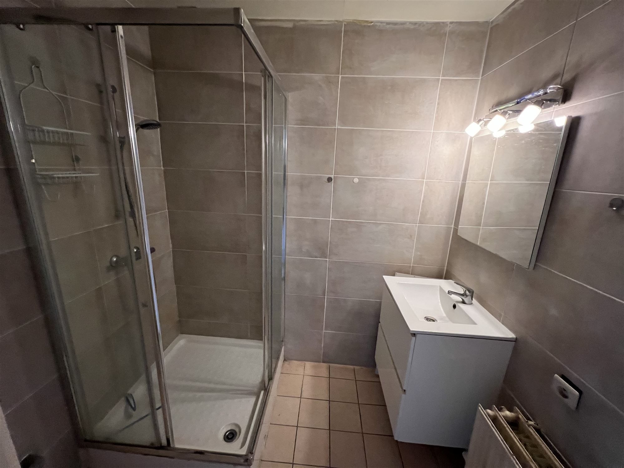 Opbrengsteigendom met 4 appartementen en tuin foto 7