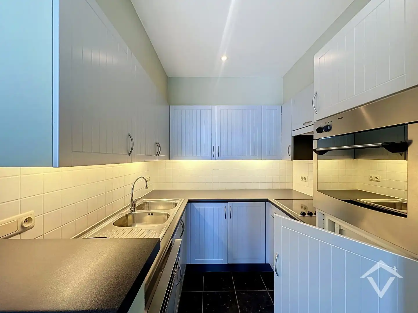 Instapklaar gelijkvloers appartement met twee slaapkamers, terras en ondergrondse parkeerplaats.  foto 7