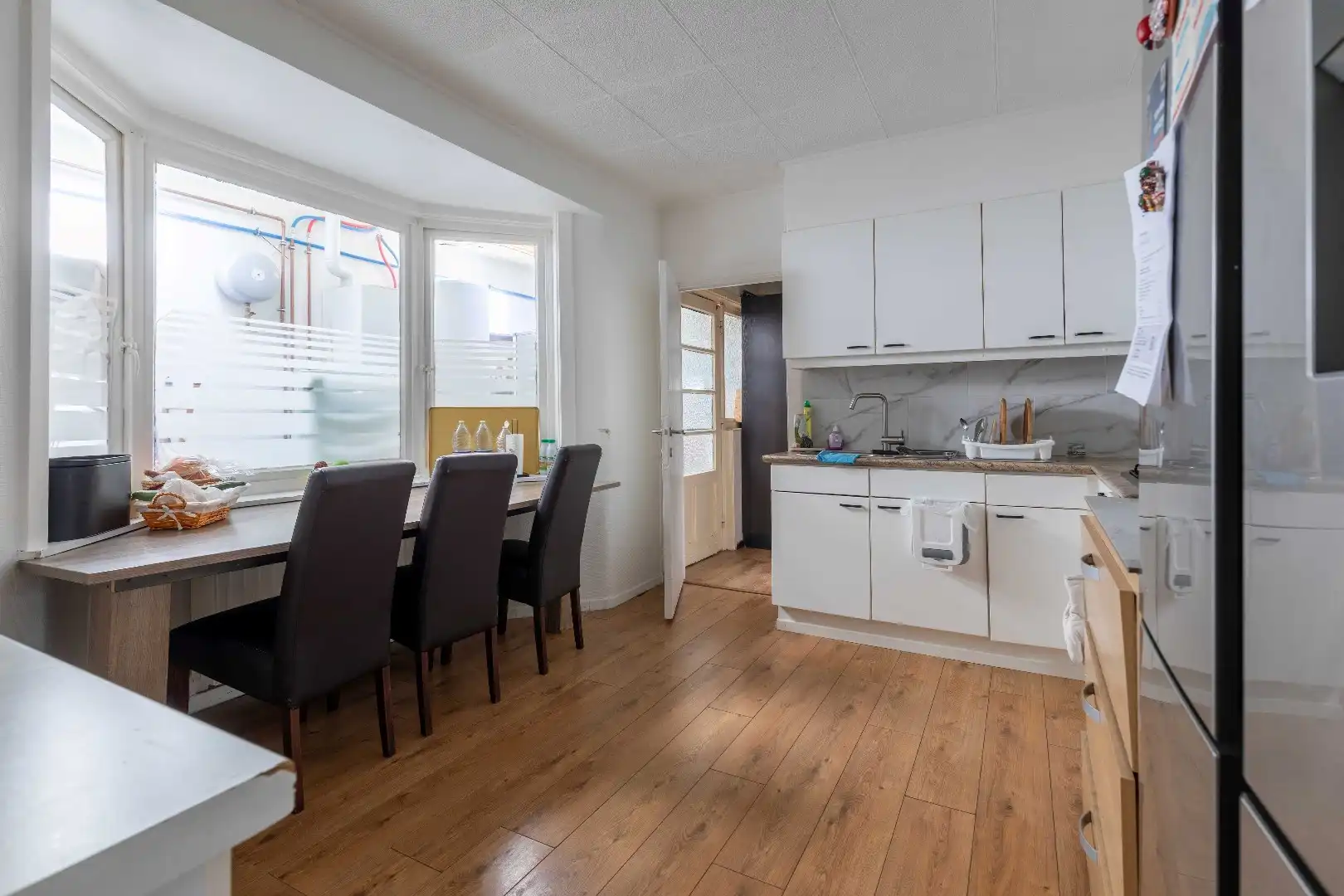 Opbrengsteigendom met handelszaak, atelier en 3 woningen foto 25