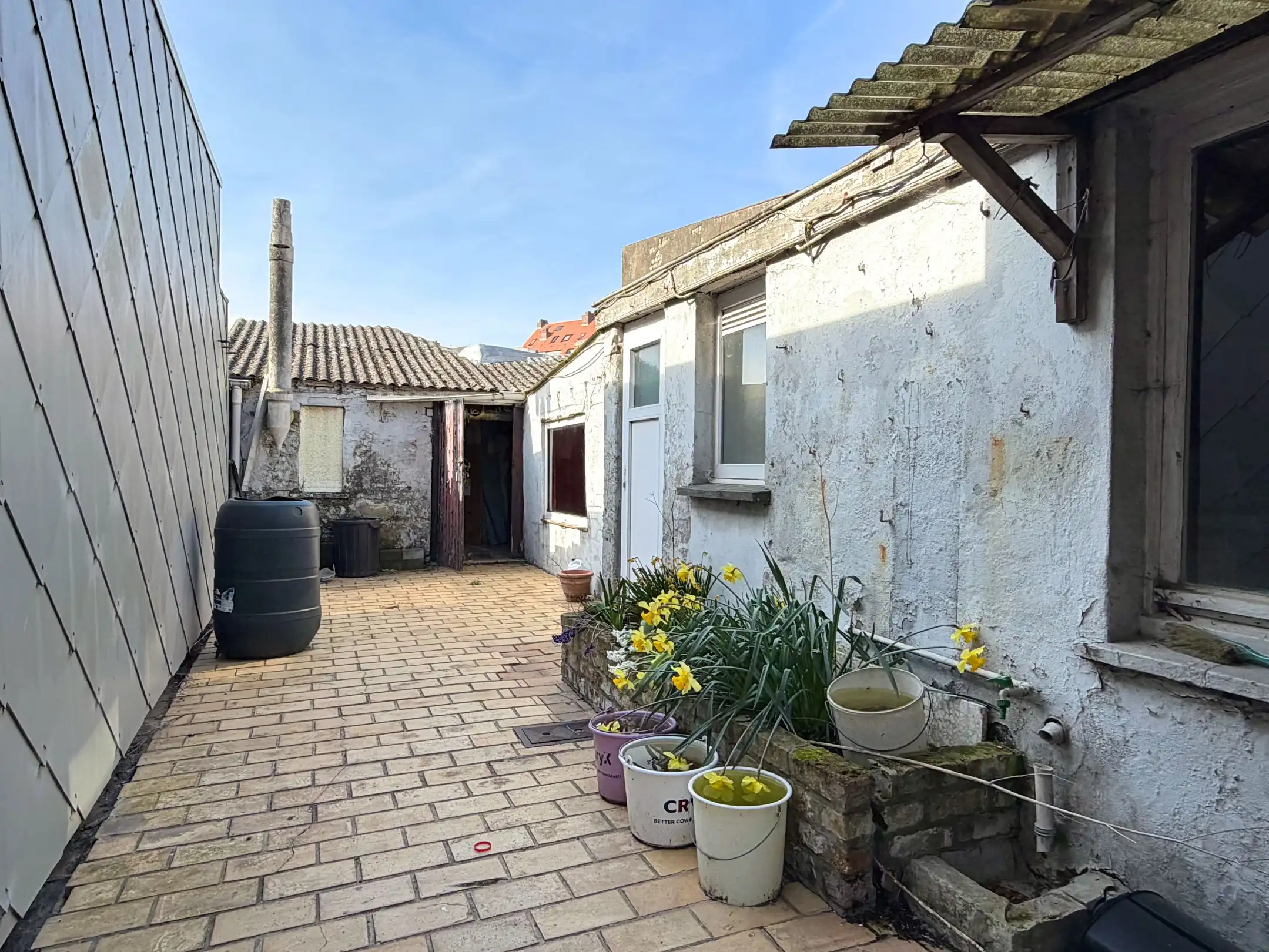 Te renoveren woonhuis met 9 slaapkamers in centrum Heist foto 4