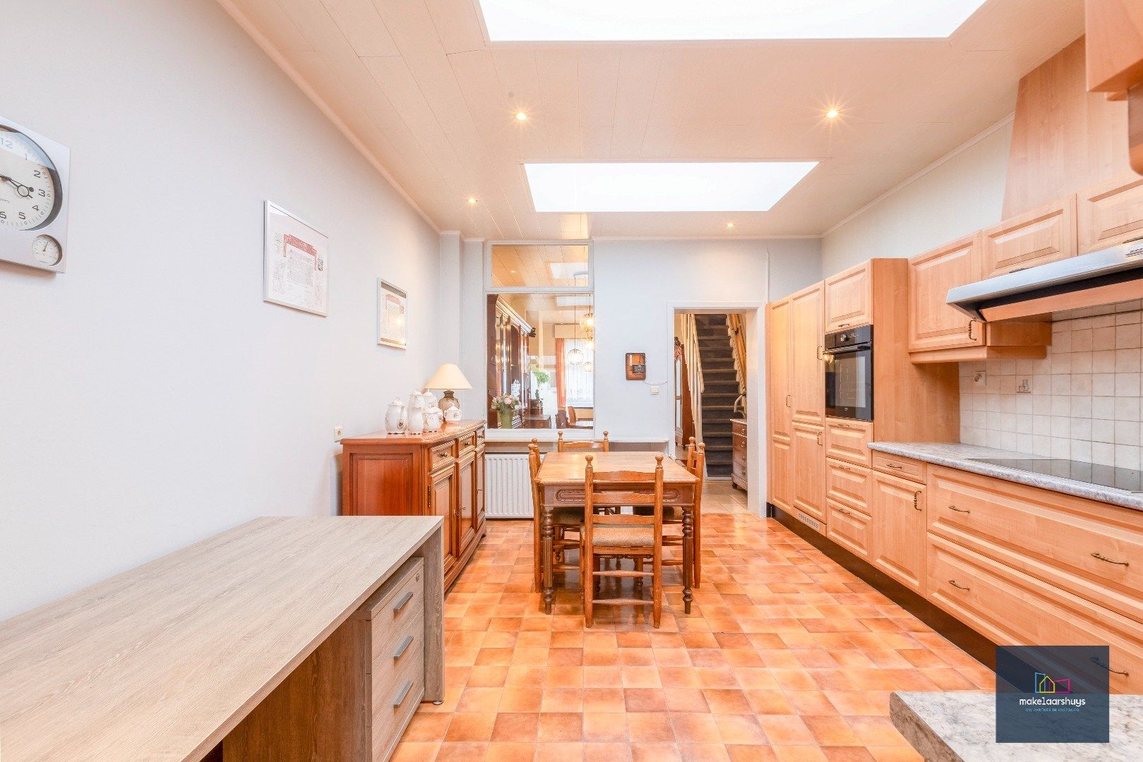 Charmante op te frissen rijwoning met ruime stadstuin  foto 6