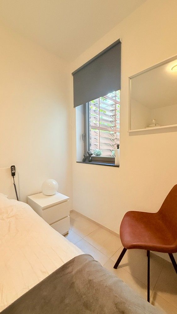 Modern gelijkvloers appartement met 1 slaapkamer en ruim terras/tuin in hartje Lanaken foto 10