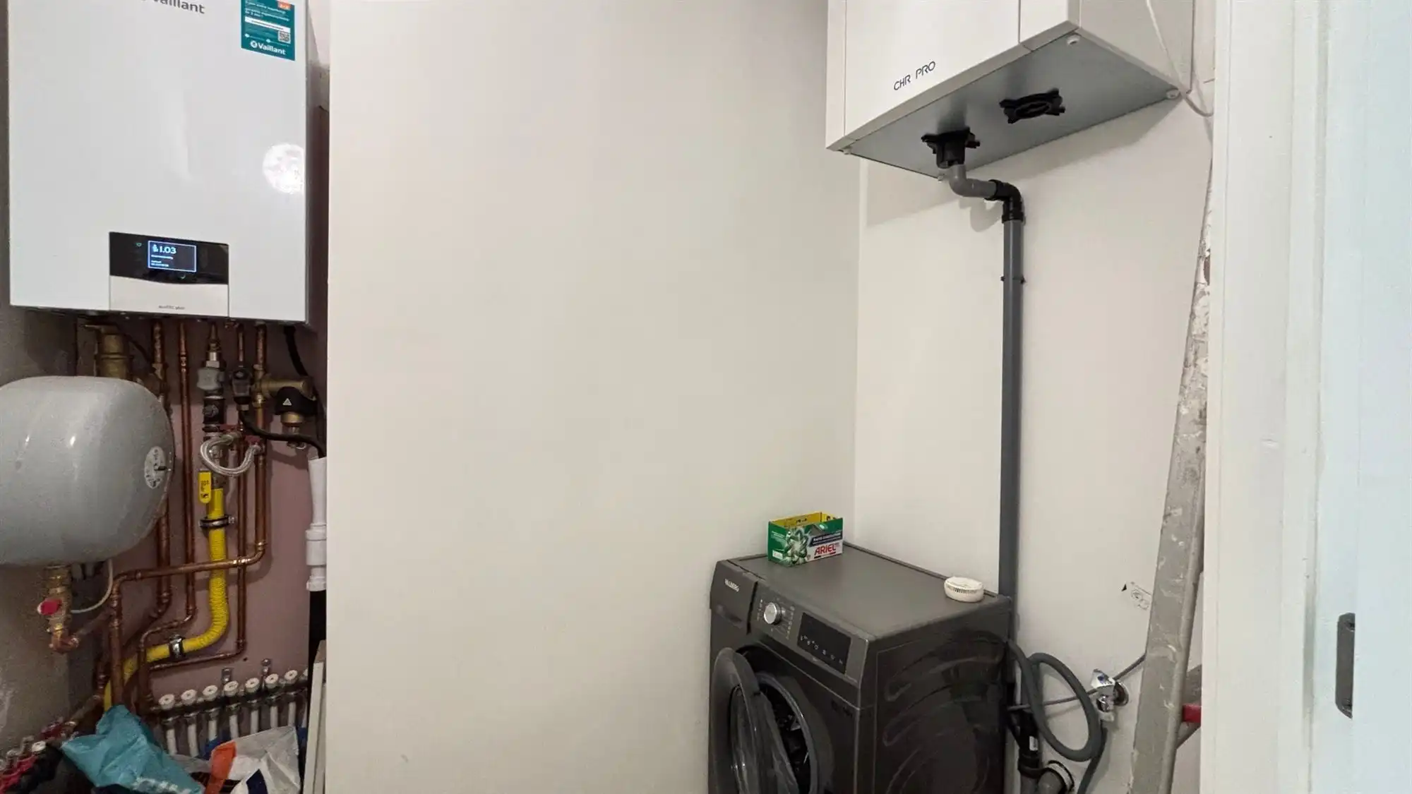 Gerenoveerd gelijkvloers appartement met tuin foto 10