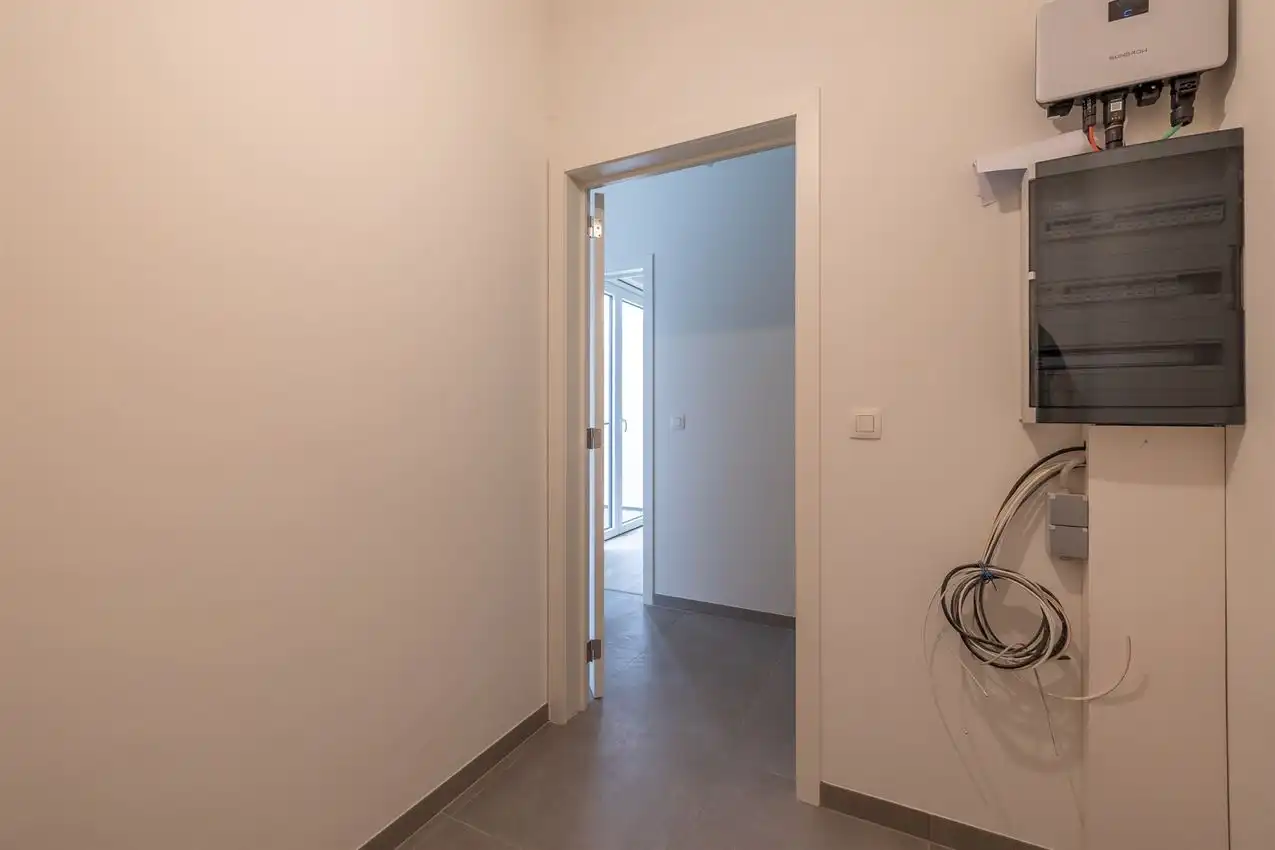 Nieuwbouwappartement met 1 slpk, autostaanplaats en terras foto 14