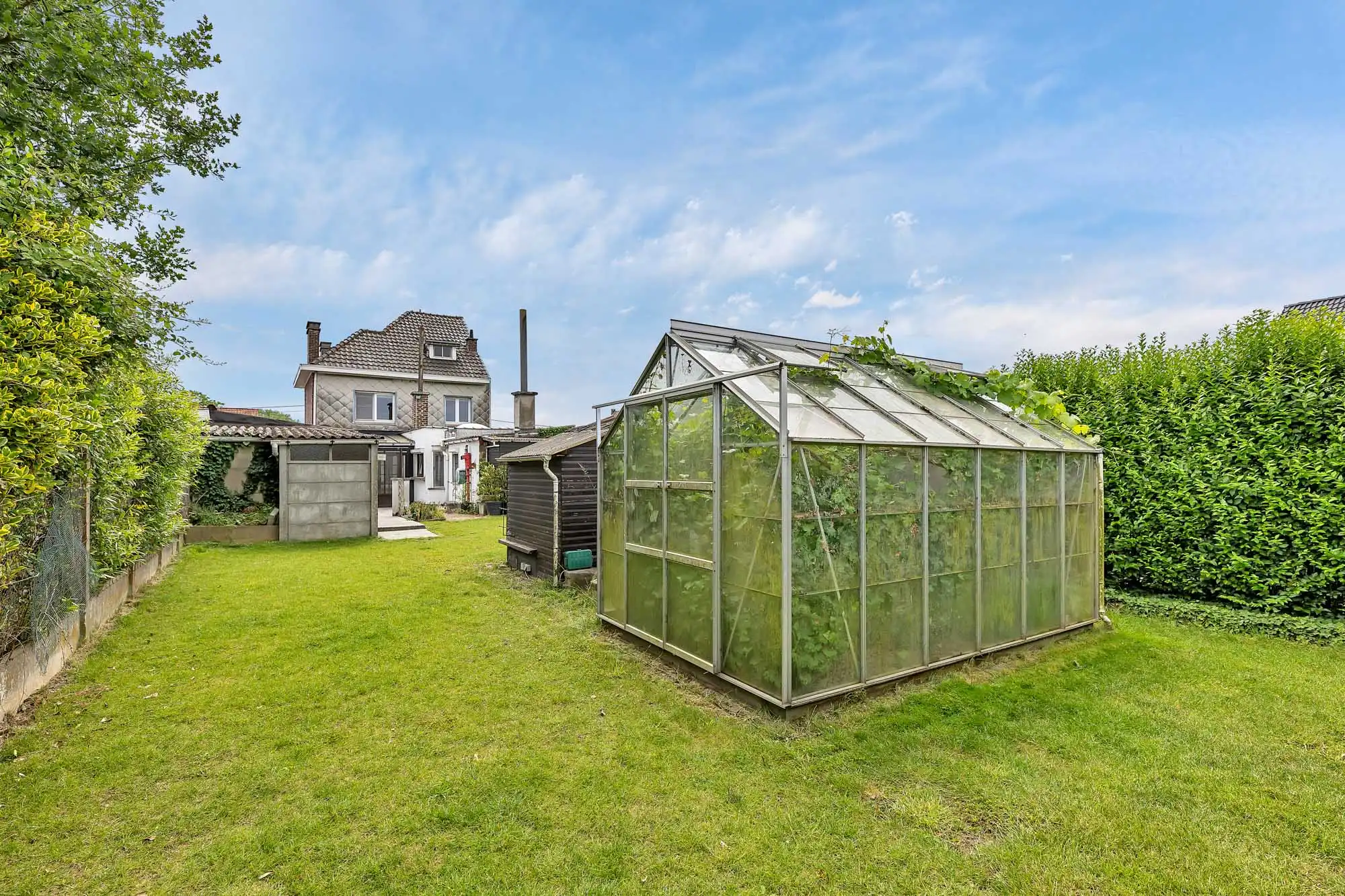 Goed onderhouden woning met garage en tuin foto 29