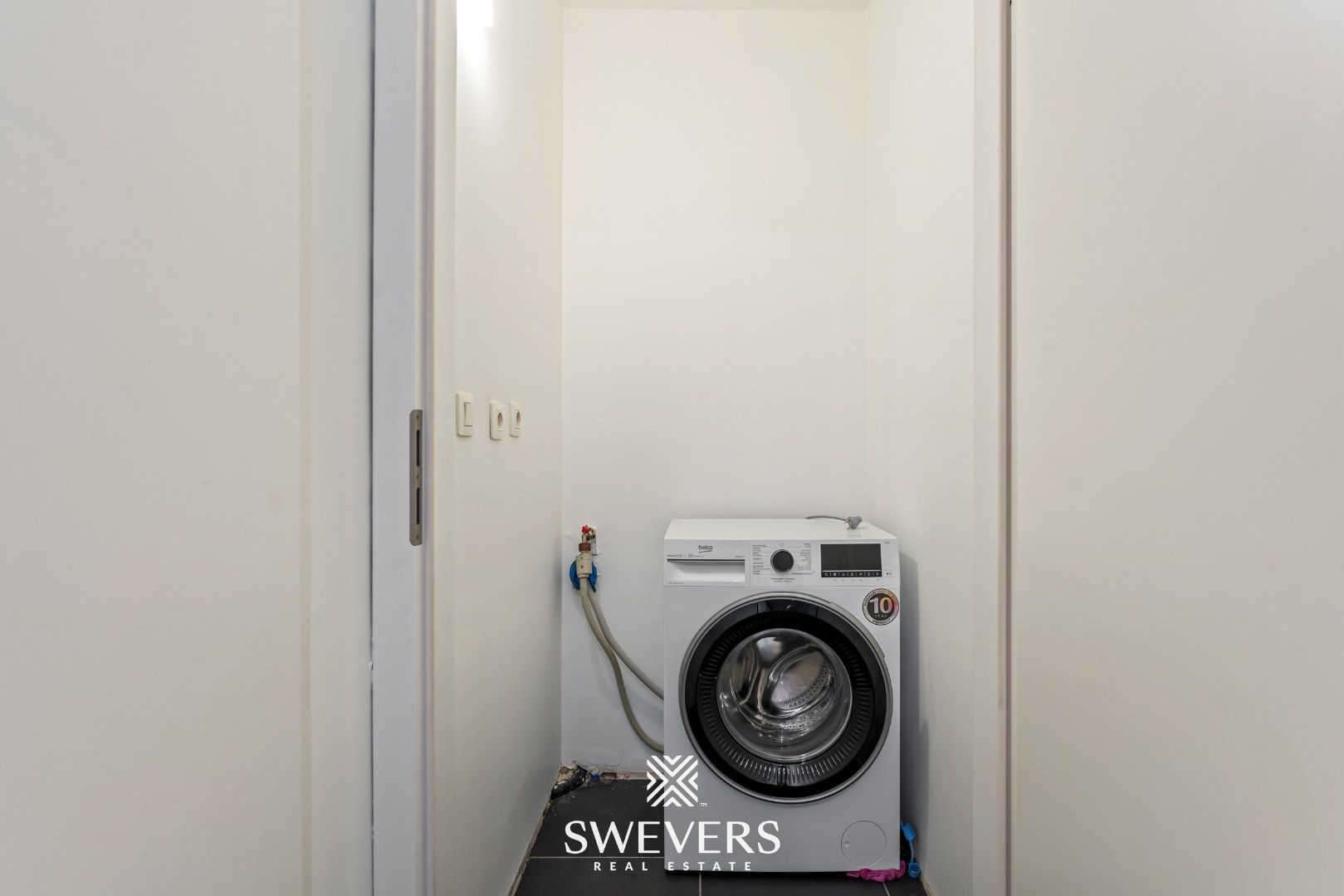 Instapklaar en energiezuinig 2-slaapkamerappartement in het centrum van Heppen foto 22