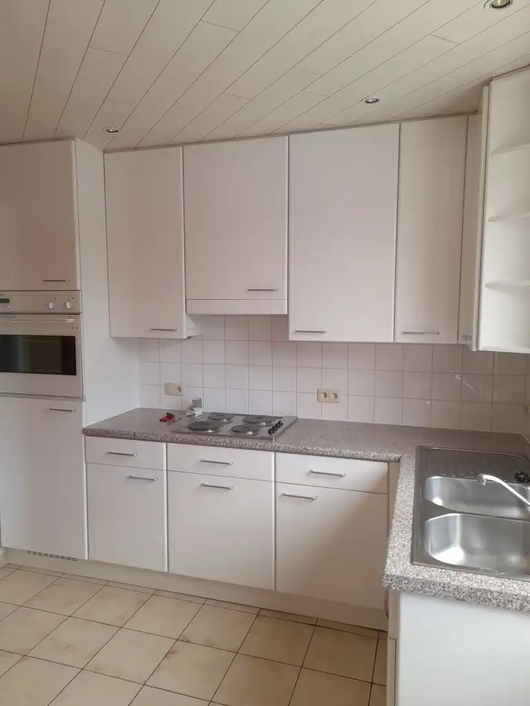 Halfopen bebouwing met 2 slpks, veranda en tuin foto 5