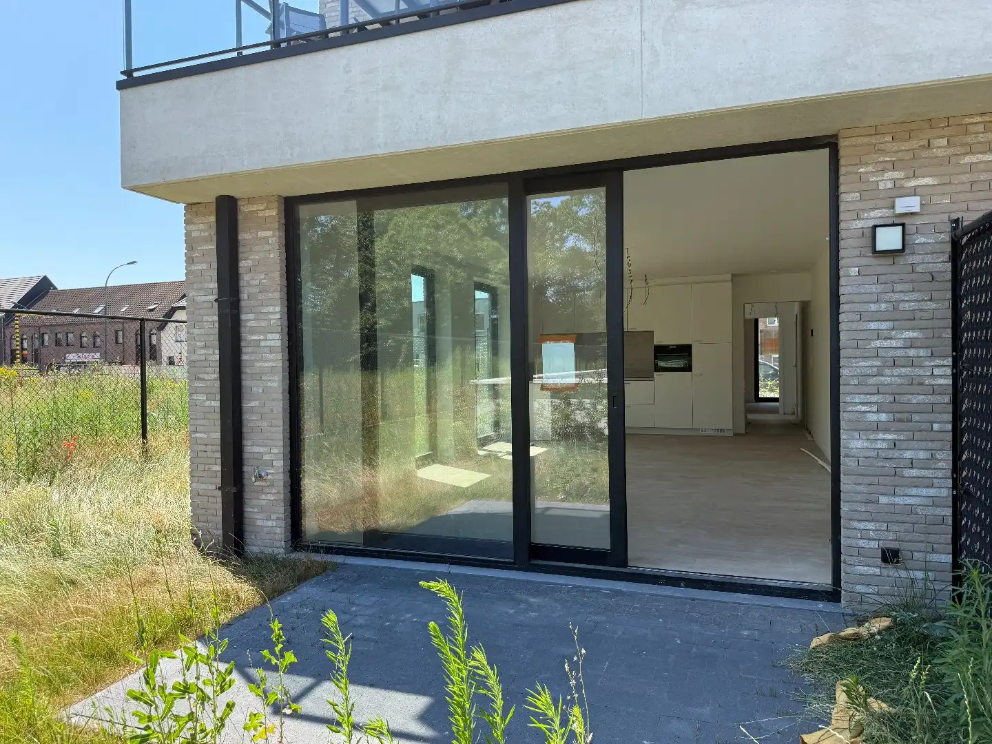 Laatste gelijkvloers 2-slpk appartement met tuin, 1 stpls en een kelder foto 7