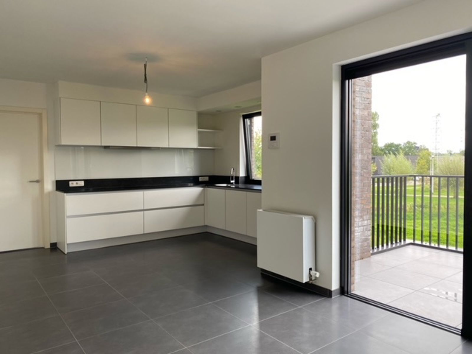 RUIM APPARTEMENT (71,35m2) MET 1 SLK, ONDERGRONDSE AUTOSTANDPLAATS EN KELDERBERGING TE HASSELT foto 5