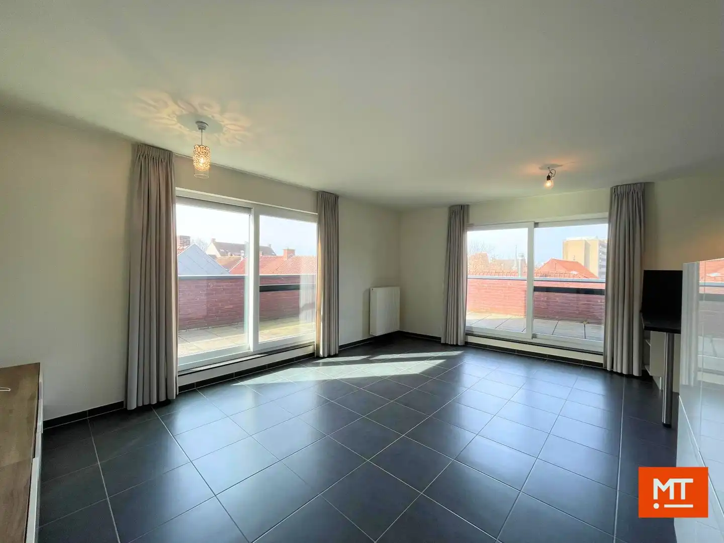 Instapklaar éénslaapkamerappartement met groot terras en ondergrondse staanplaats te huur in Izegem foto 5