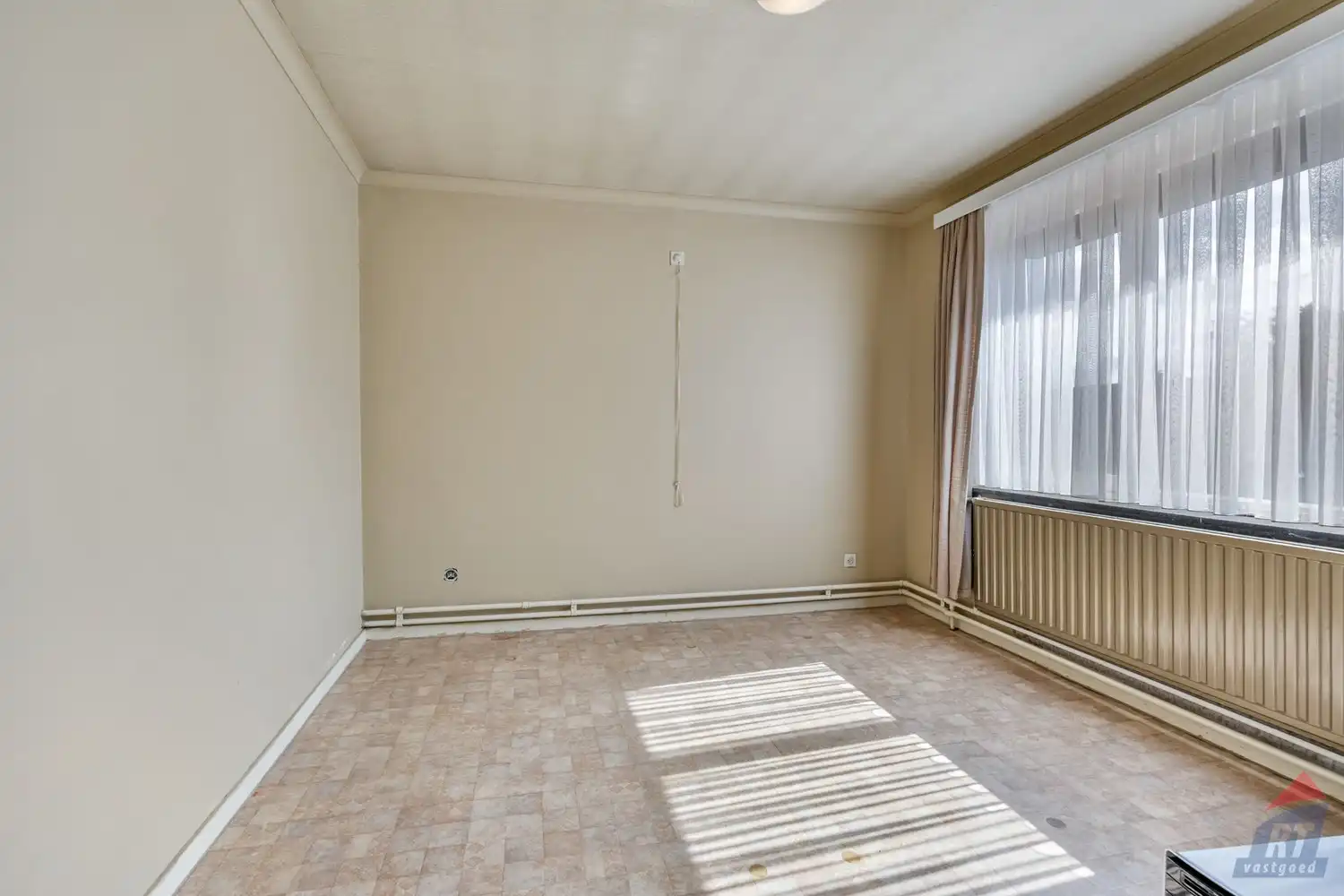 Rustig gelegen, op te frissen woning in Alken foto 11