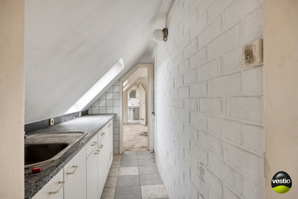 COMPLEX BESTAANDE UIT 14 TE RENOVEREN STUDIO'S MET UITBREIDINGSMOGELIJKHEDEN TE VELDWEZELT. foto 28