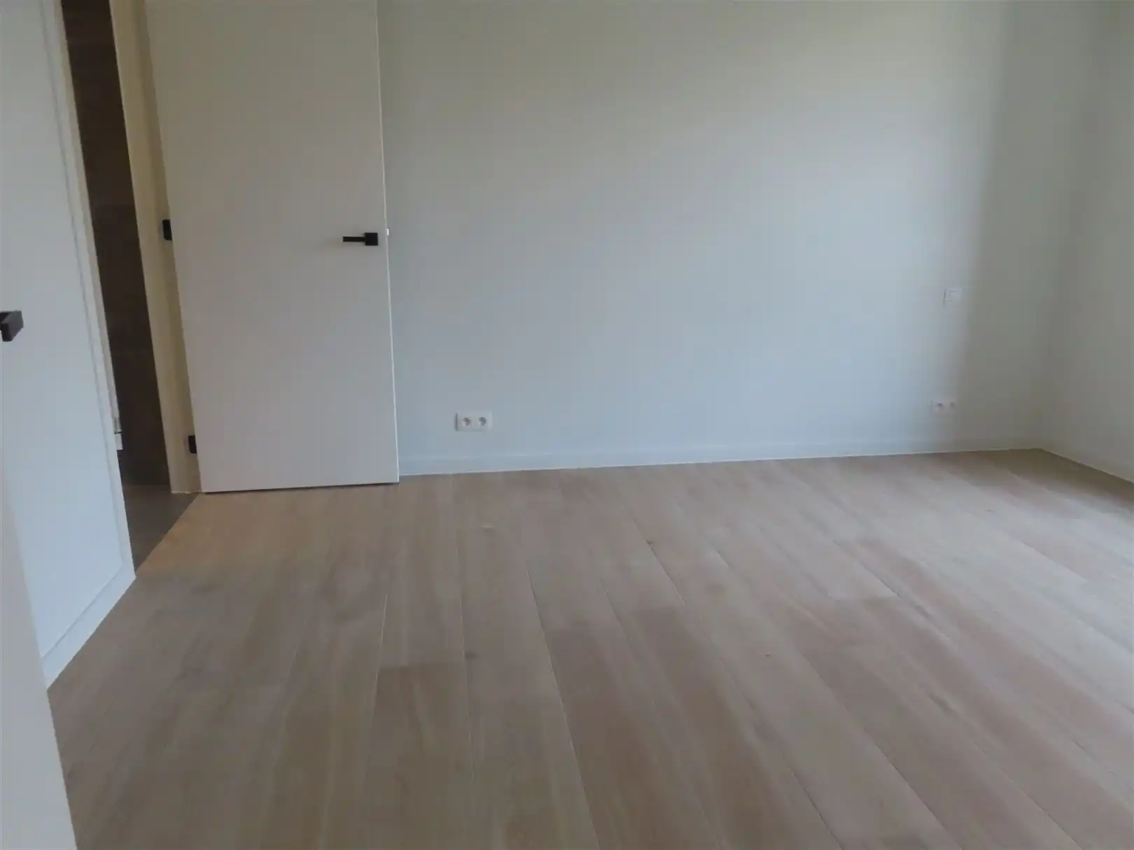 Prachtig nieuwbouwappartement met 2slpk, 2 badk, terras & P foto 11