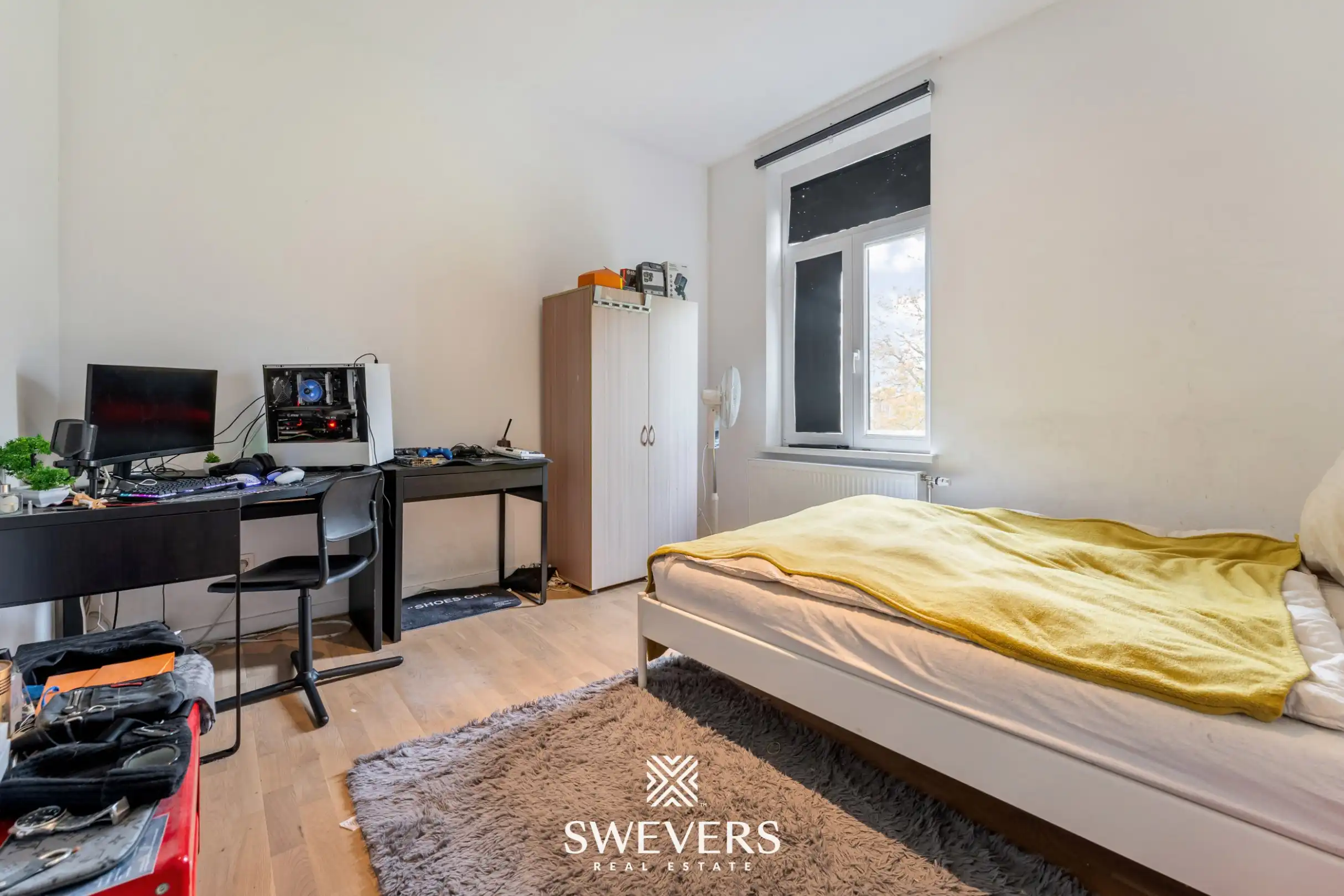 Instapklare stadswoning met zonnige tuin op toplocatie nabij centrum Leuven foto 12