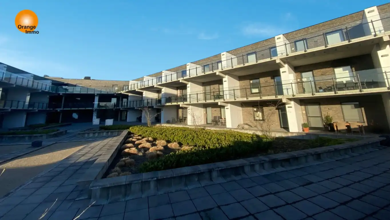 Ruim nieuwbouwappartement in het commercieel centrum van Eisden. foto 3