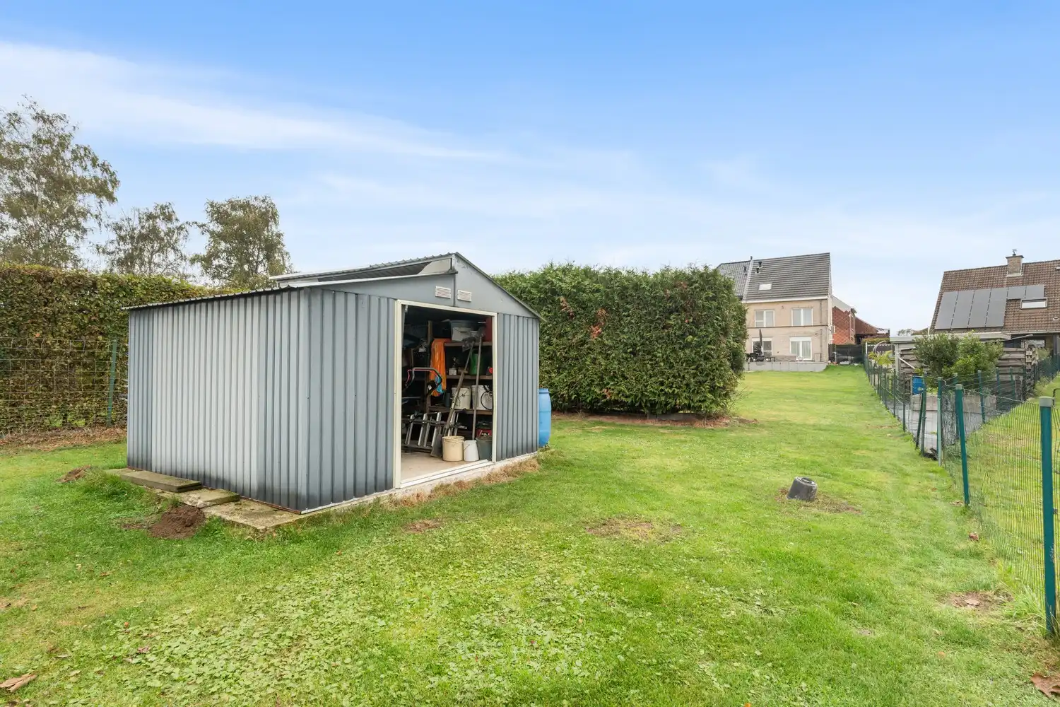 Prachtige 3-gevelwoning met studio, grote tuin en vrij uitzicht foto 23
