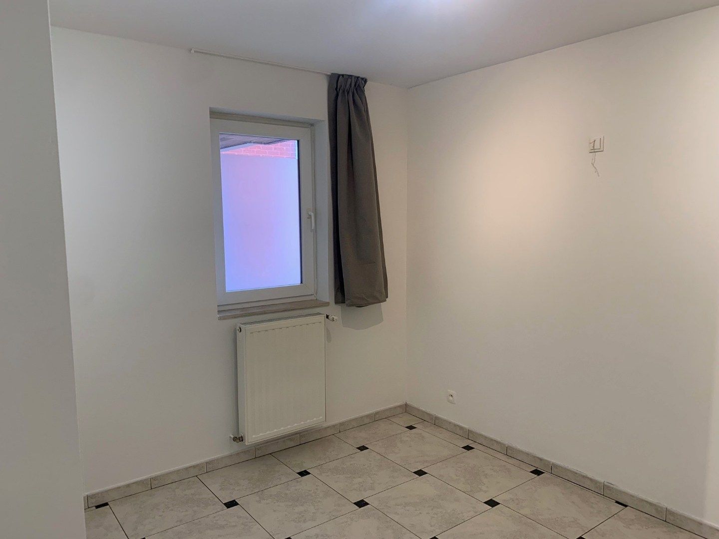 Opgefrist knap appartement op het gelijkvloers, eventueel met garagebox foto 14