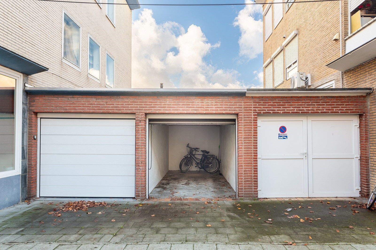 Ruim gelijkvloers appartement met 3 slp, stadskoer en garage foto 18