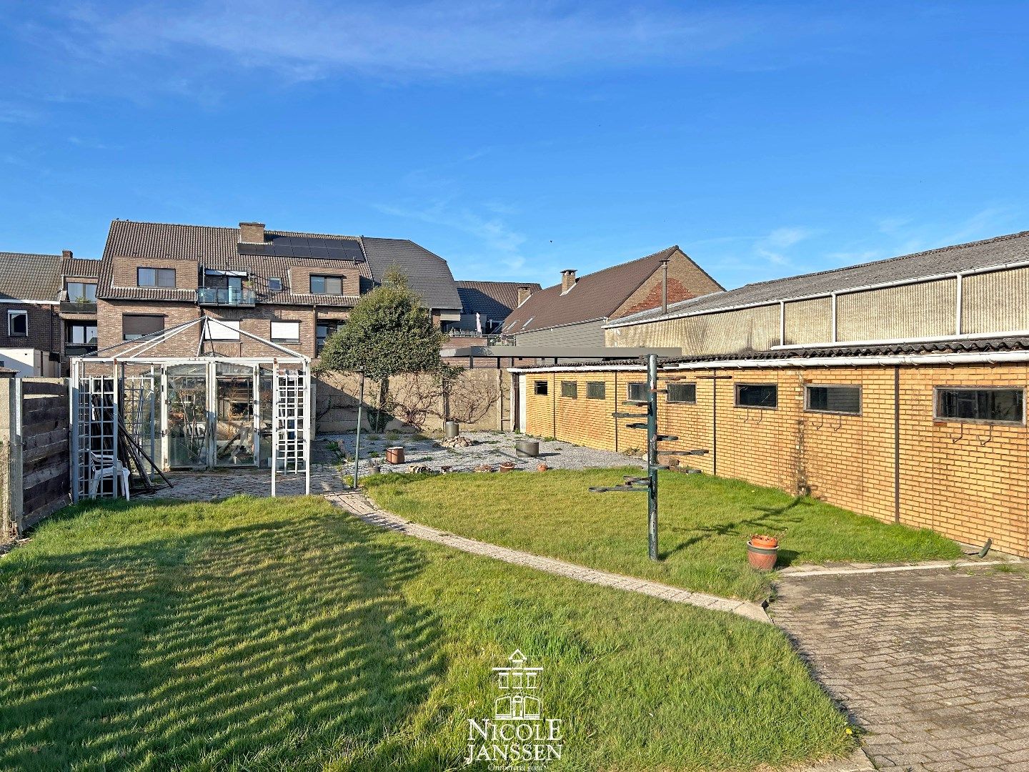 Verzorgde gelijkvloerse woning met tuin in verzorgde straat in centrum van Dilsen foto 18