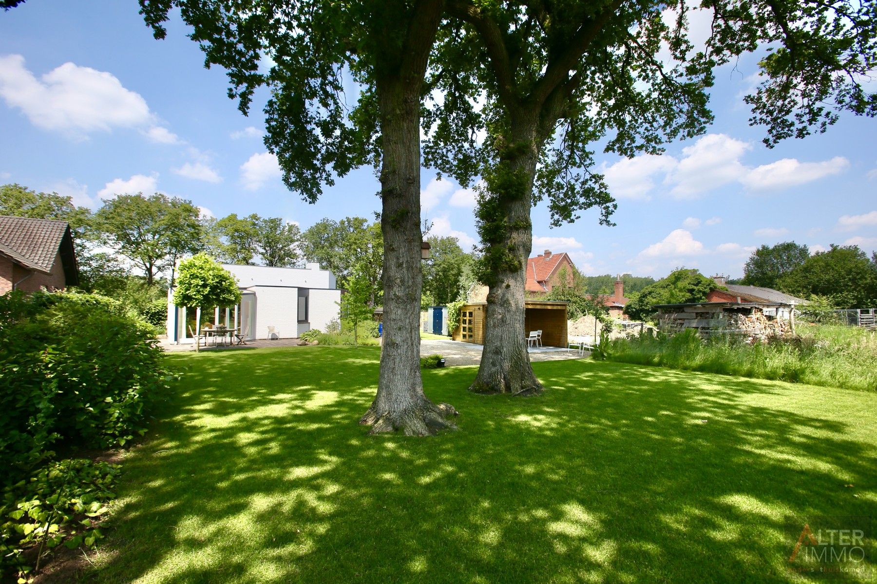 Stijlvolle, tijdloze en volledig gelijkvloerse woning met 3 slaapkamers, inpandige garage, tuinlounge en een schitterende tuin met een adembenemend uitzicht op een oase van groen! foto 25