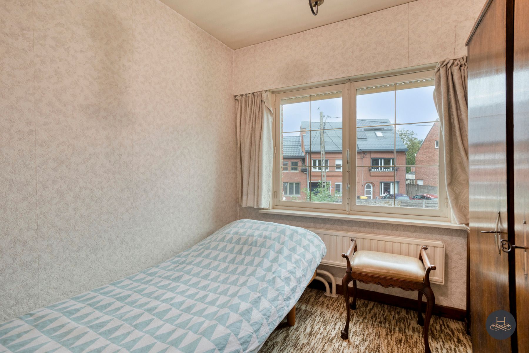 Halfopen woning met tuin en renovatiepotentieel foto 15