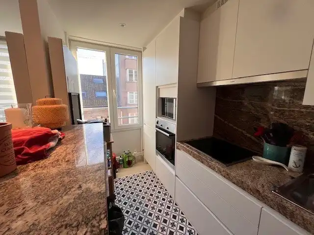 Appartement te koop – VME RAVELINGEN – 4de verdieping, centrum Oostende foto 3