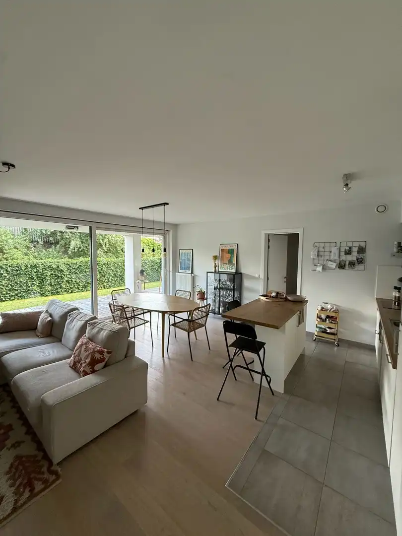 Gelijkvloers appartement met tuin, terras en ondergrondse autostaanplaats foto {{pictureIndex}}