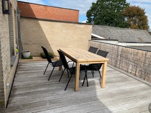 TE HUUR | Instapklaar 2-slaapkamerappartement met ruim terras en garage. foto 22