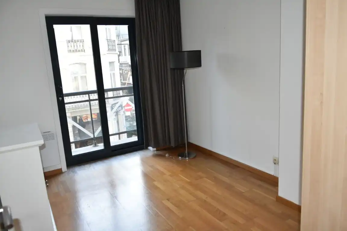 Centraal gelegen appartement met 2 slaapkamers foto 8