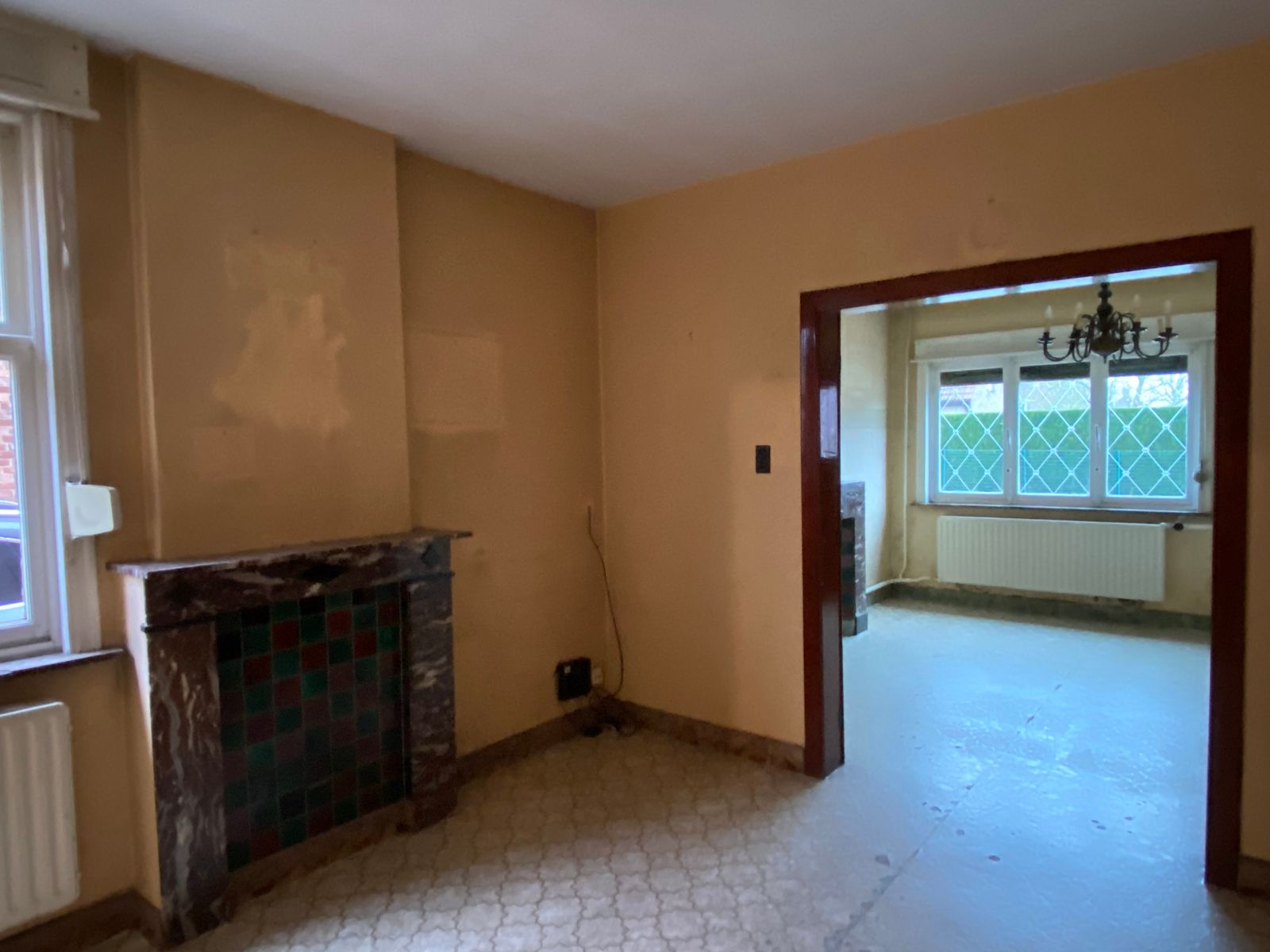 Zeer goed gelegen te renoveren woning foto 2