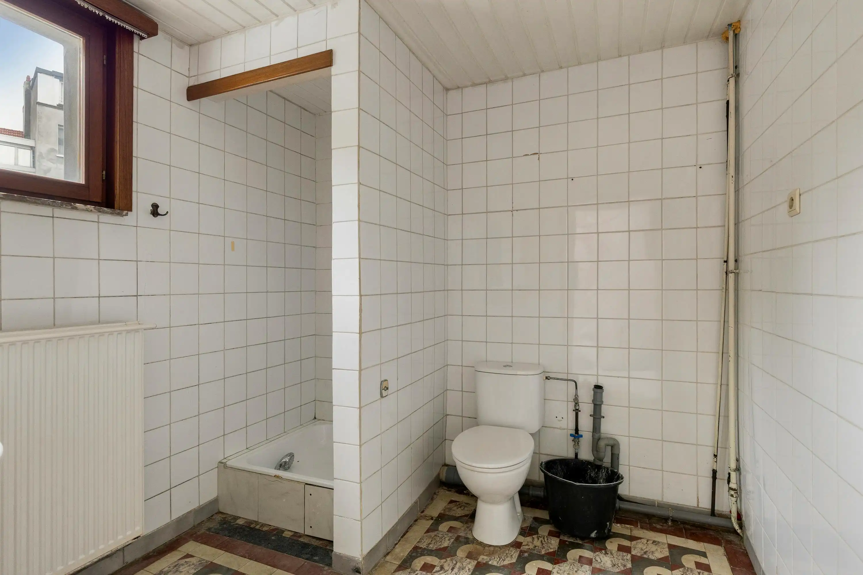 Op te frissen huis met 4 slaapkamers te koop in Borgerhout! foto 15
