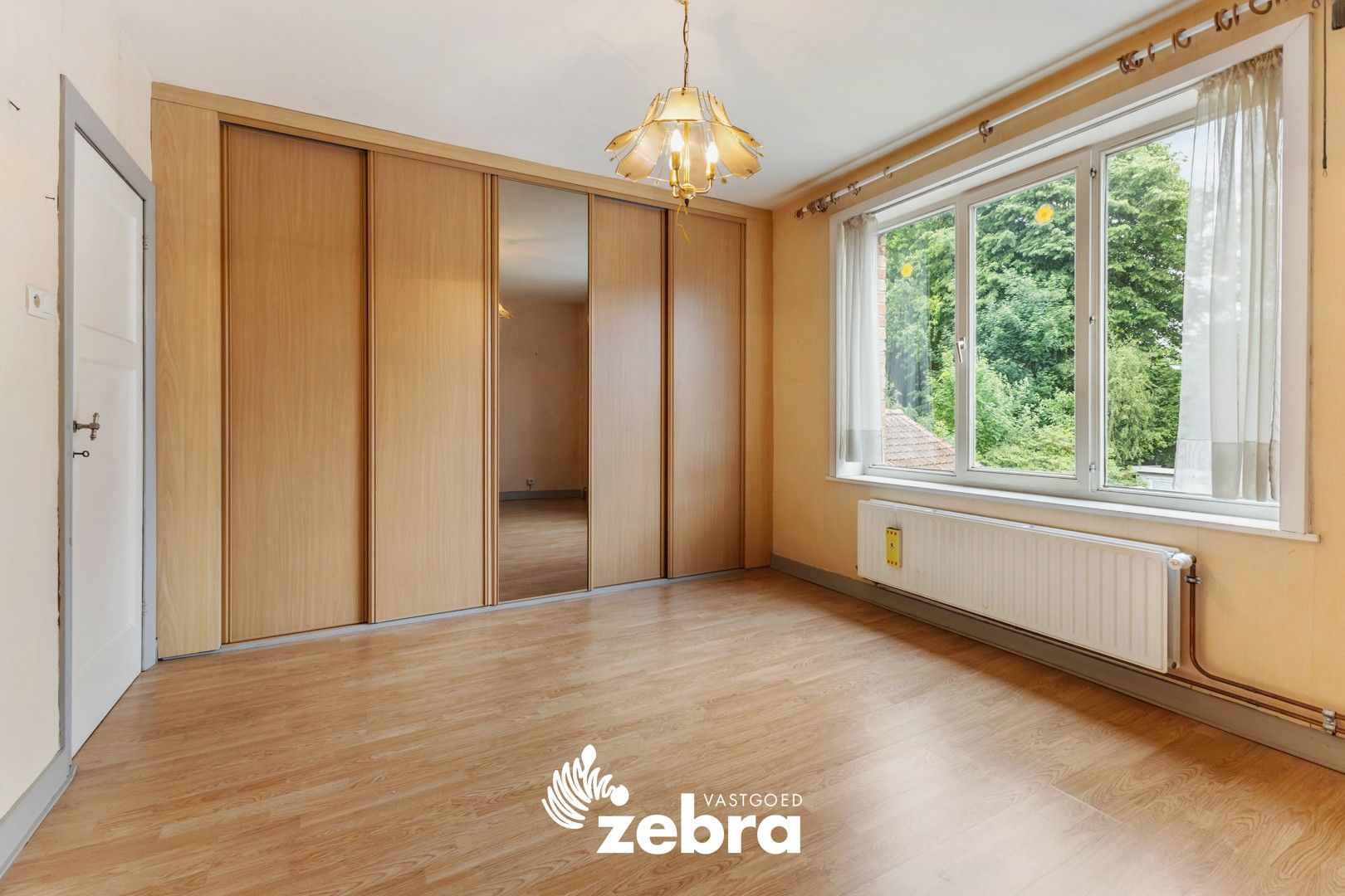 Op te frissen woning met vier slaapkamers te Assebroek! foto 11