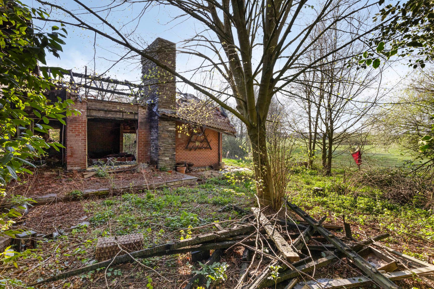 OPTIE Uitzonderlijk perceel bouwgrond met afgebrande woning foto 5