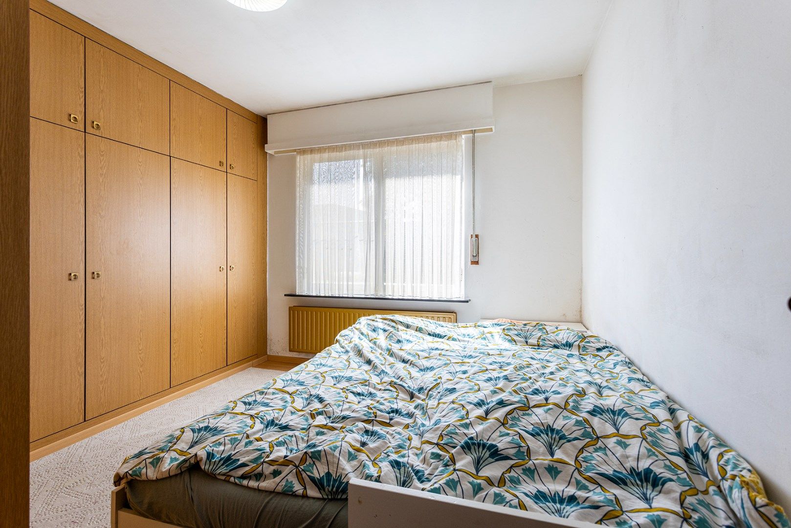 Gelijkvloers 2 slpk appartement met koer! foto 8