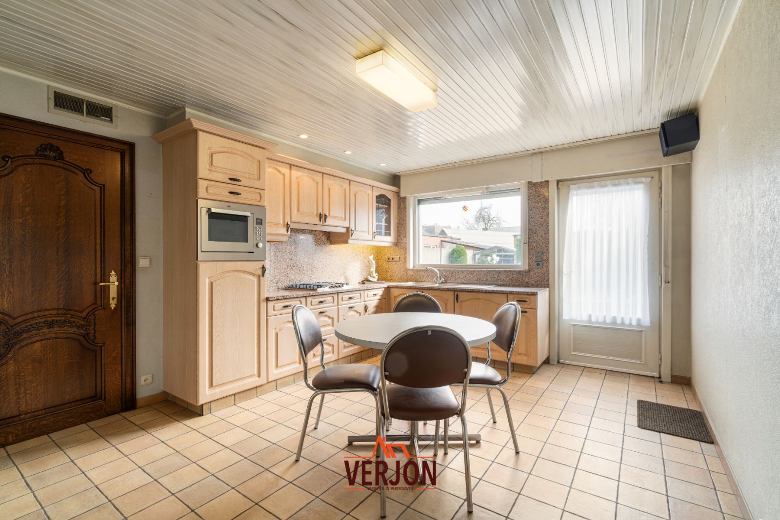 Woning met zuidgerichte tuin te koop in Kachtem! foto 6