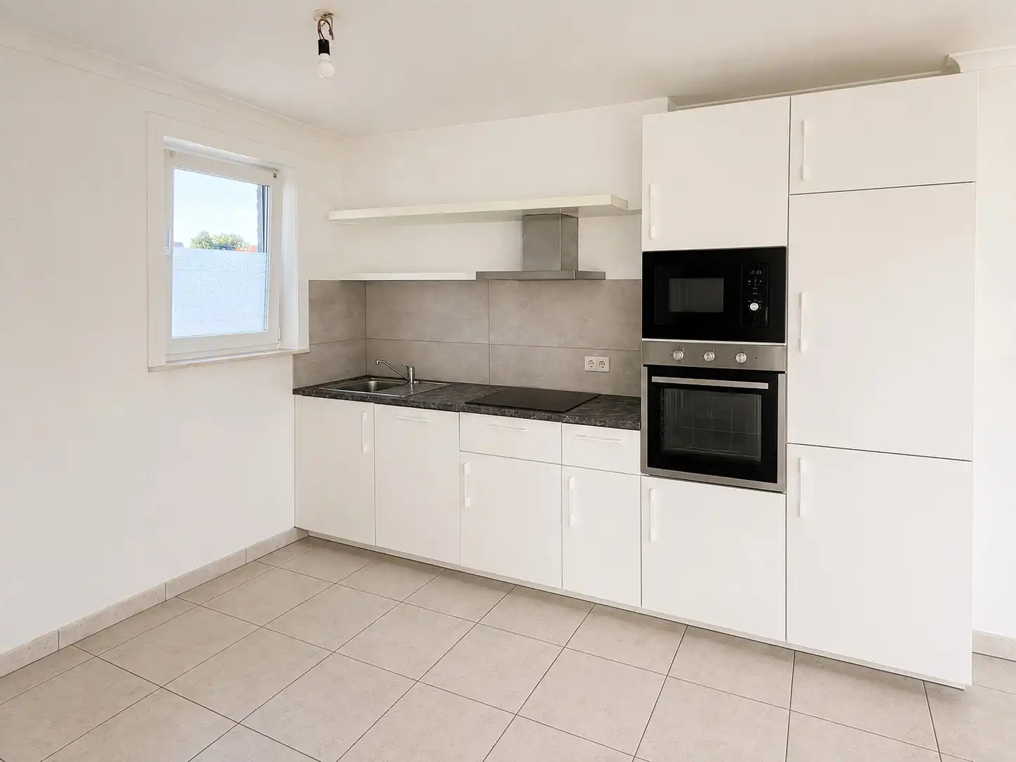 Ruim duplexappartement met 3 slaapkamers nabij het centrum. foto 6