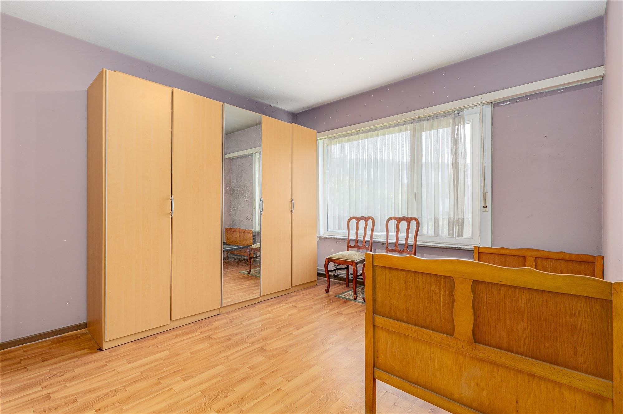 Te renoveren woning met 3 slpk, terras en ruime tuin in Wommelgem! foto 12