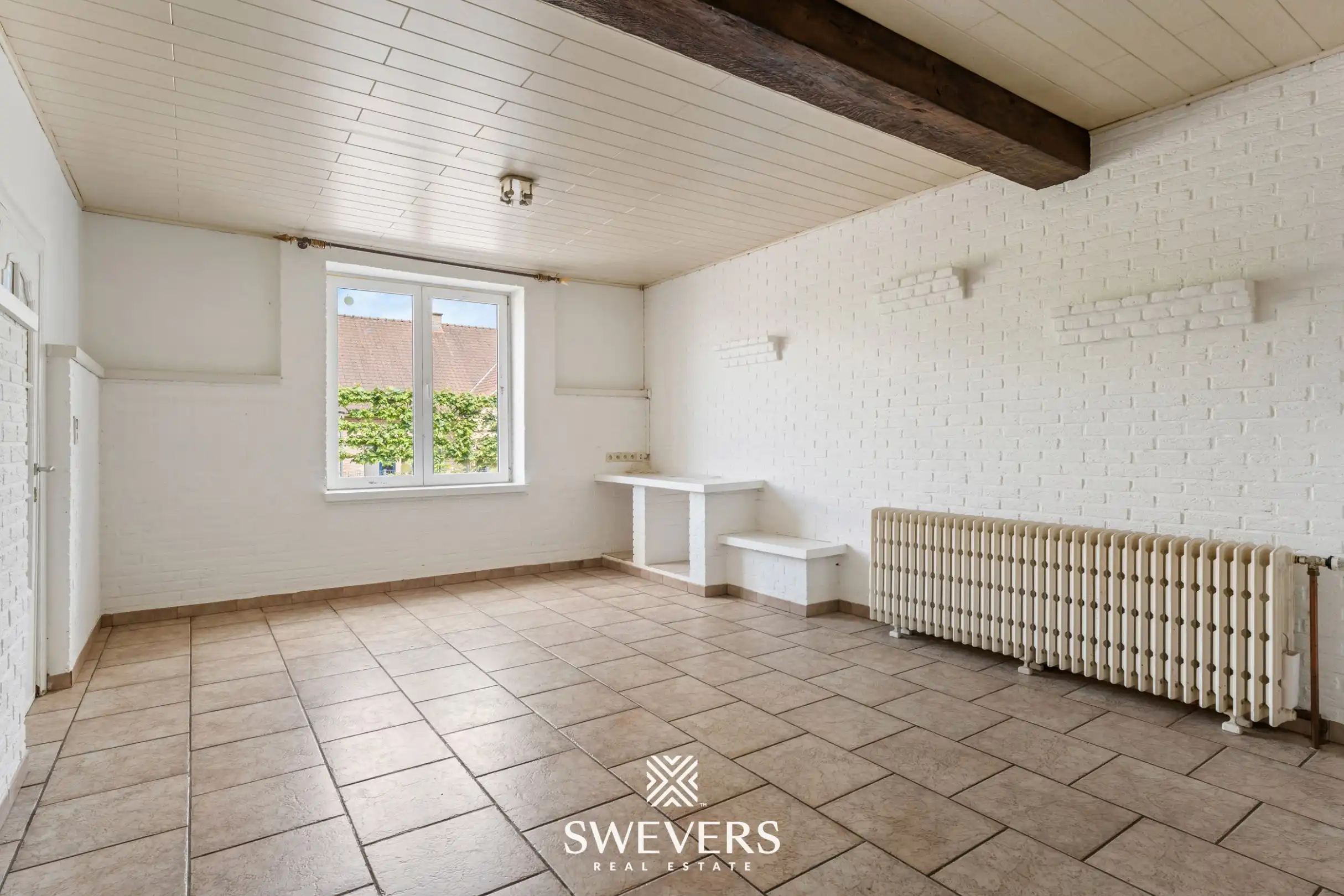Charmante open bebouwing met 3 slaapkamers, zonnige tuin en renovatiepotentieel foto 4