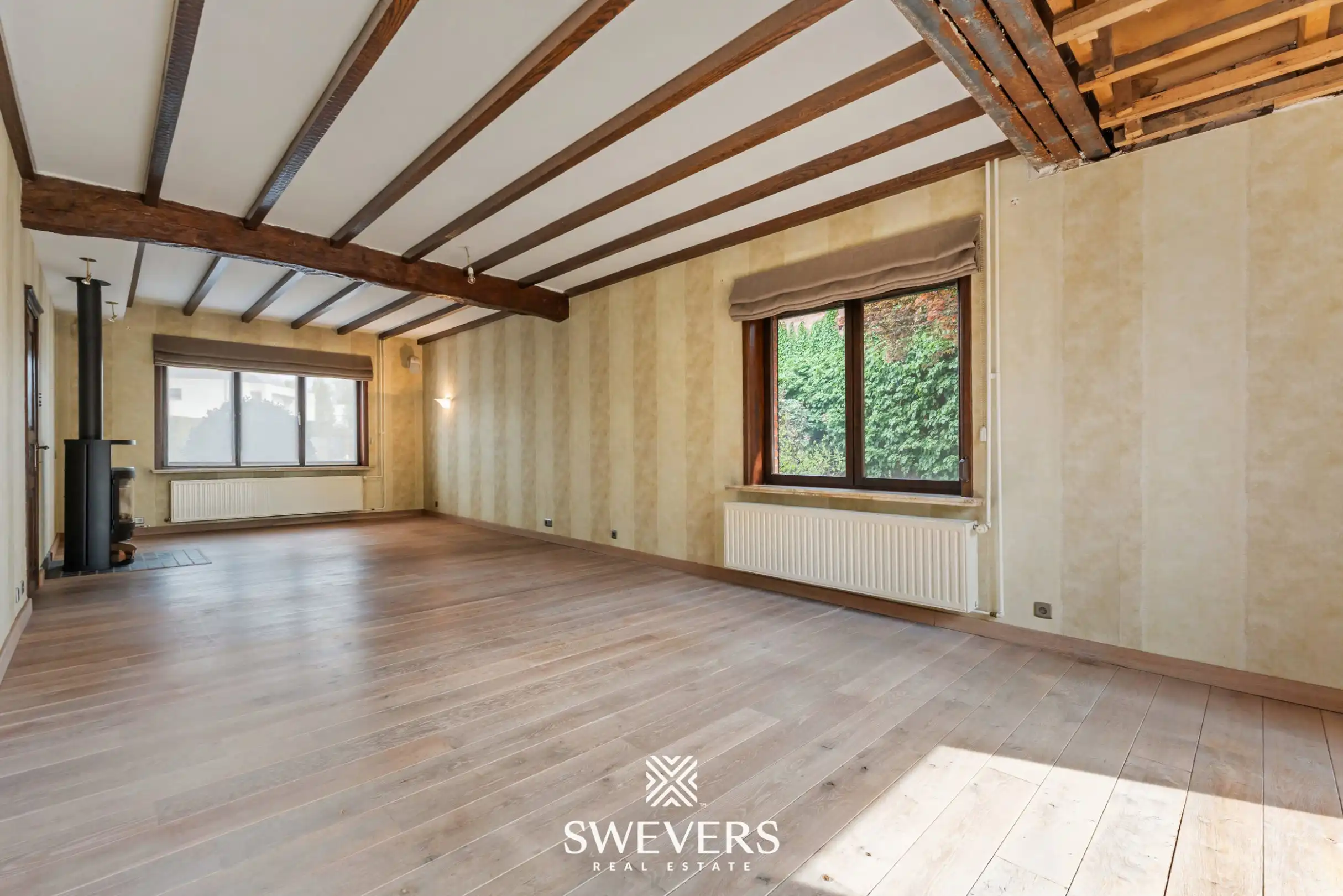 Verrassend ruime woning tot 5 à 6 slaapkamers in het centrum van Zonhoven foto 3