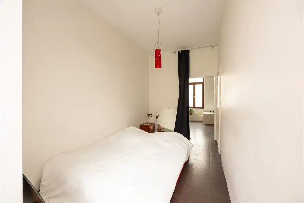 Karaktervolle gezinswoning met  groene stadstuin foto 14