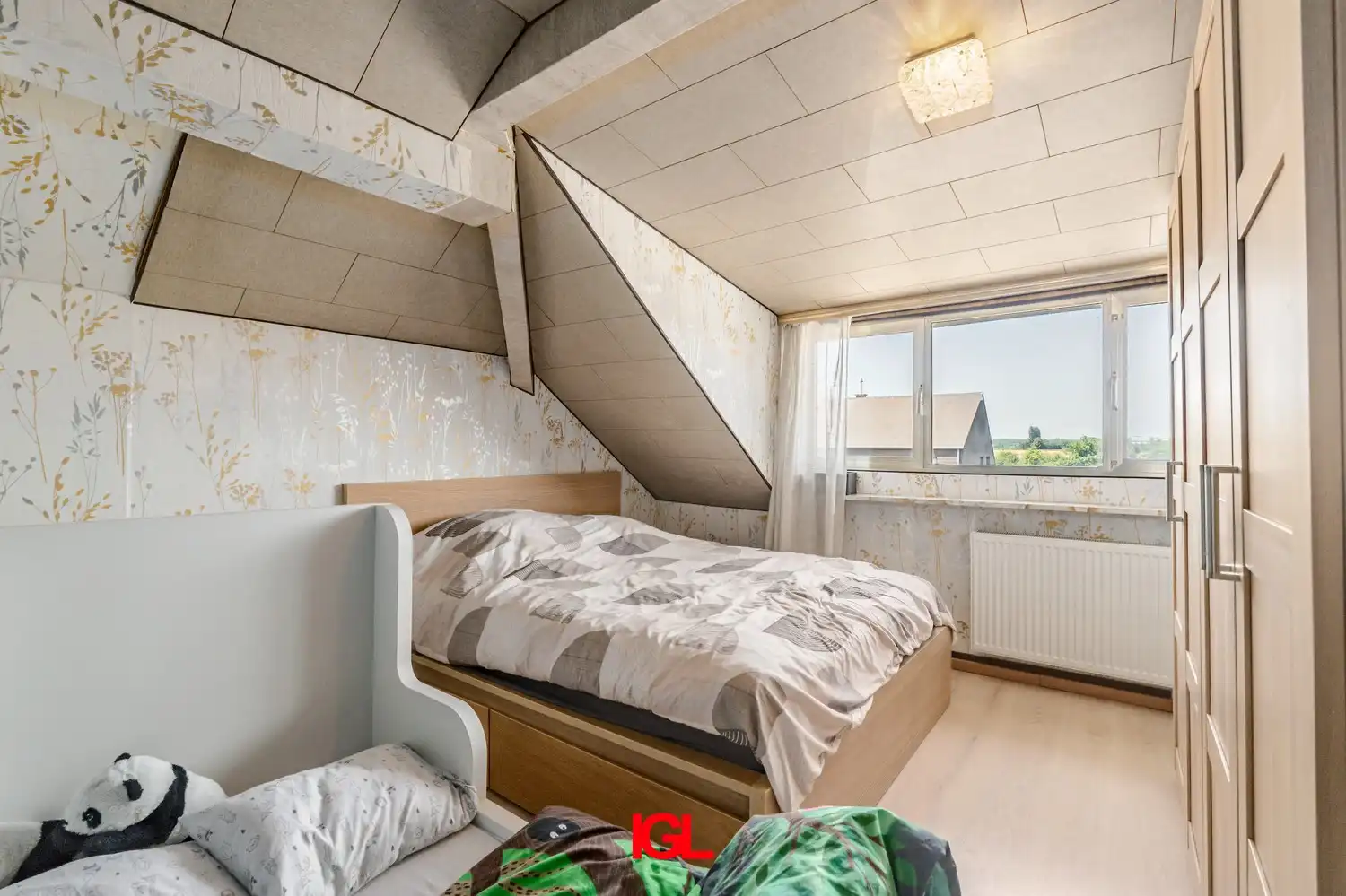 3-gevel woning met zuidgerichte tuin en garage foto 10