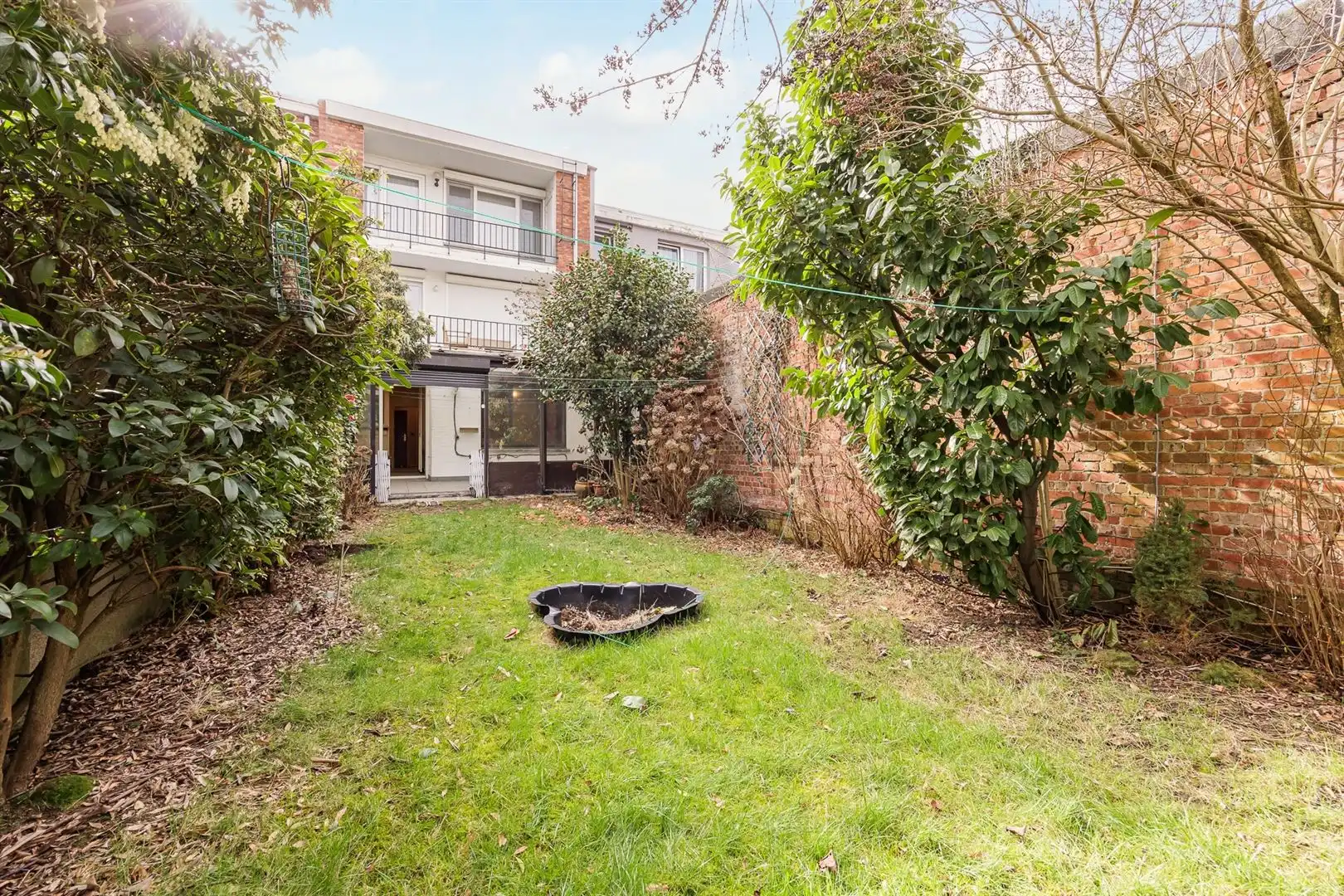 Hoofdfoto van de publicatie: Gelijkvloers appartement met tuin