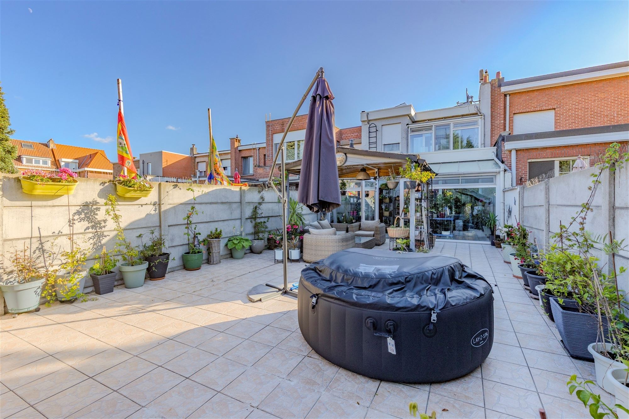 Mooi ingerichte woning met 4 slk, 2 badk en ruime stadstuin in Merksem foto 4
