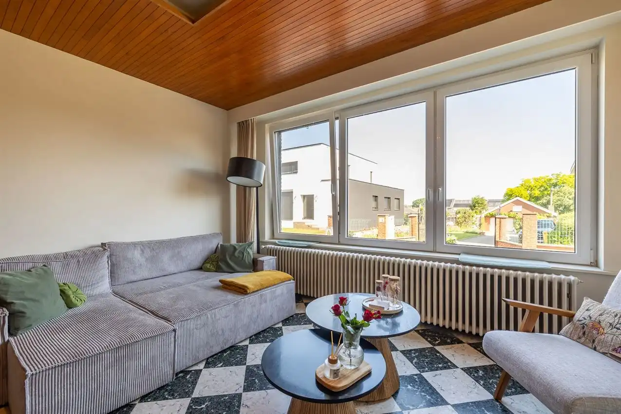 Ruime retrowoning met EPC C,  zuidtuin en achterliggende toegang. foto 34