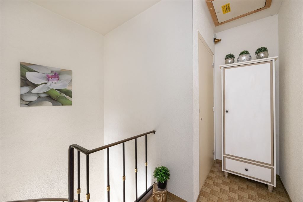 Woning vol potentieel met grote zonnige tuin foto 14