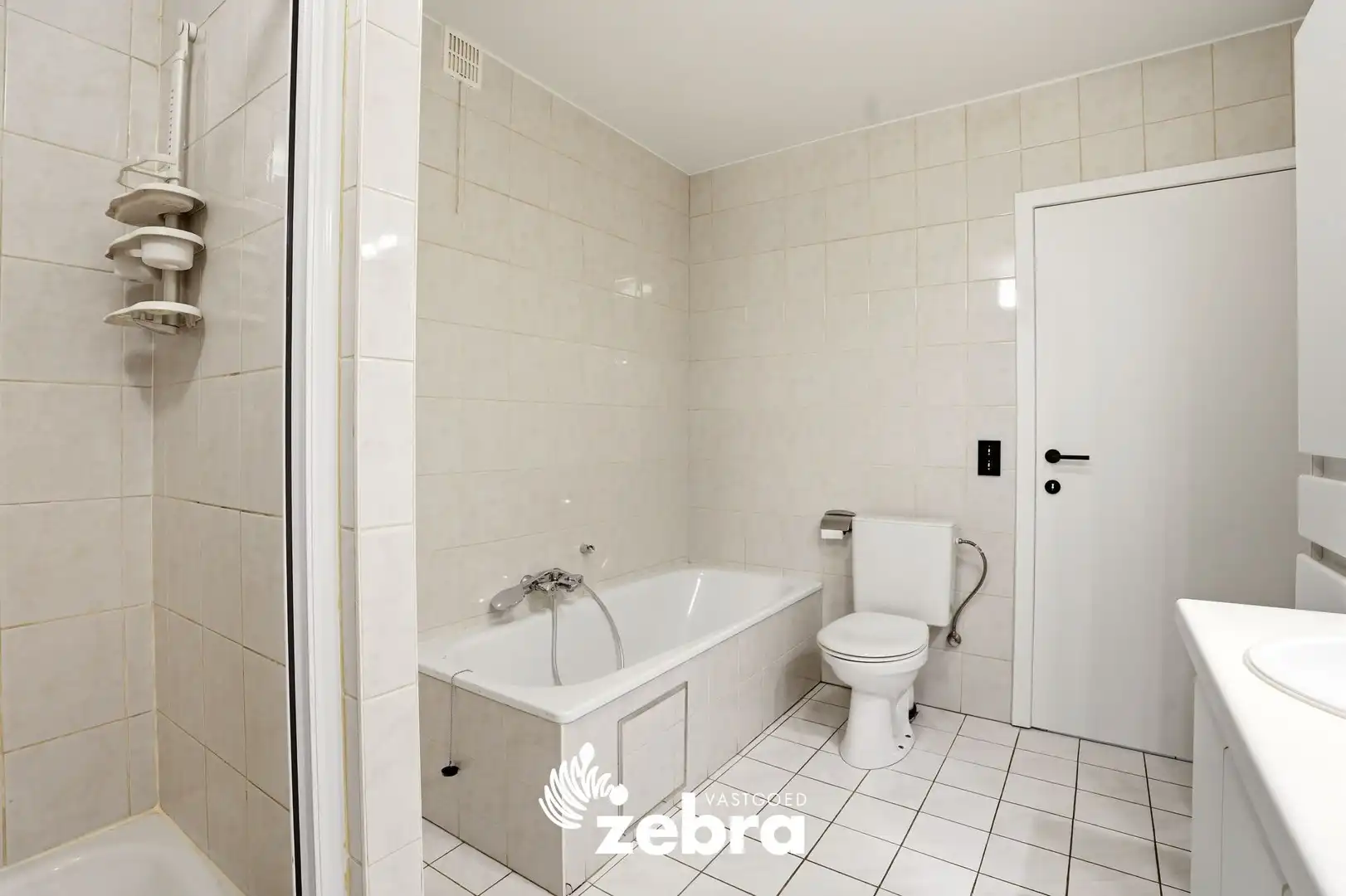 Zeer ruim appartement (137 m²) te koop met dubbele garage in het hartje van Tielt! foto 28